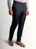 Olive pinstripe trousers shown full length on a model