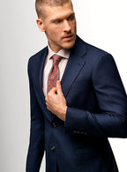 Close view of the subtle plaid in the navy cloth