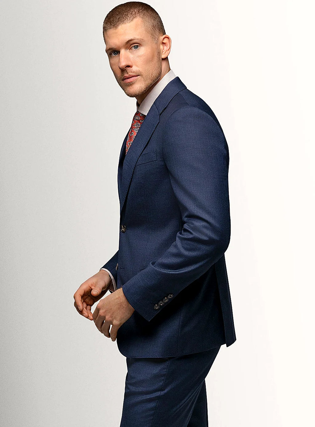 Collar and lapel detail of the navy suit jacket