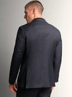 Notch lapel detail of the charcoal suit jacket