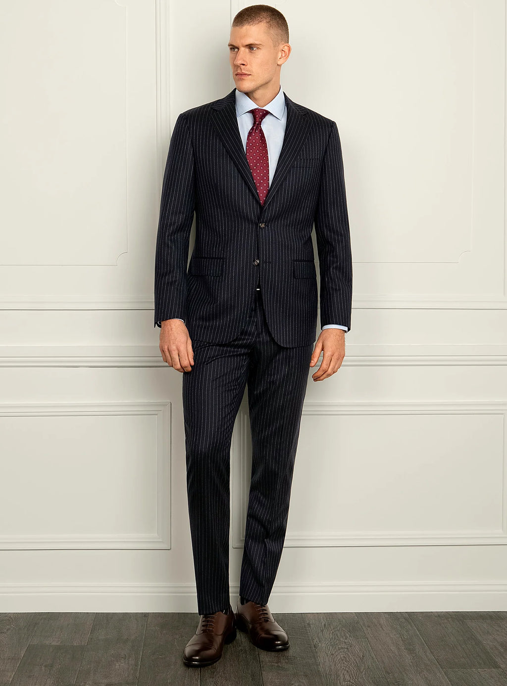 Side angle of the pinstripe jacket and trousers