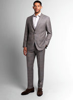 Three-quarter view of the brown jacket and trousers