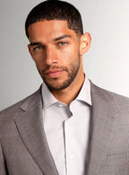 Close view of the tonal plaid across the jacket body