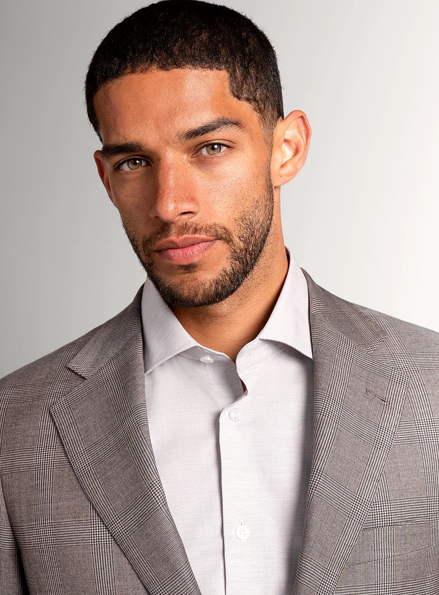Close view of the tonal plaid across the jacket body