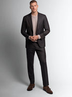 Three-quarter view of the brown jacket and trousers