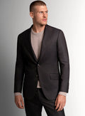 Chocolate brown pinstripe suit worn full length