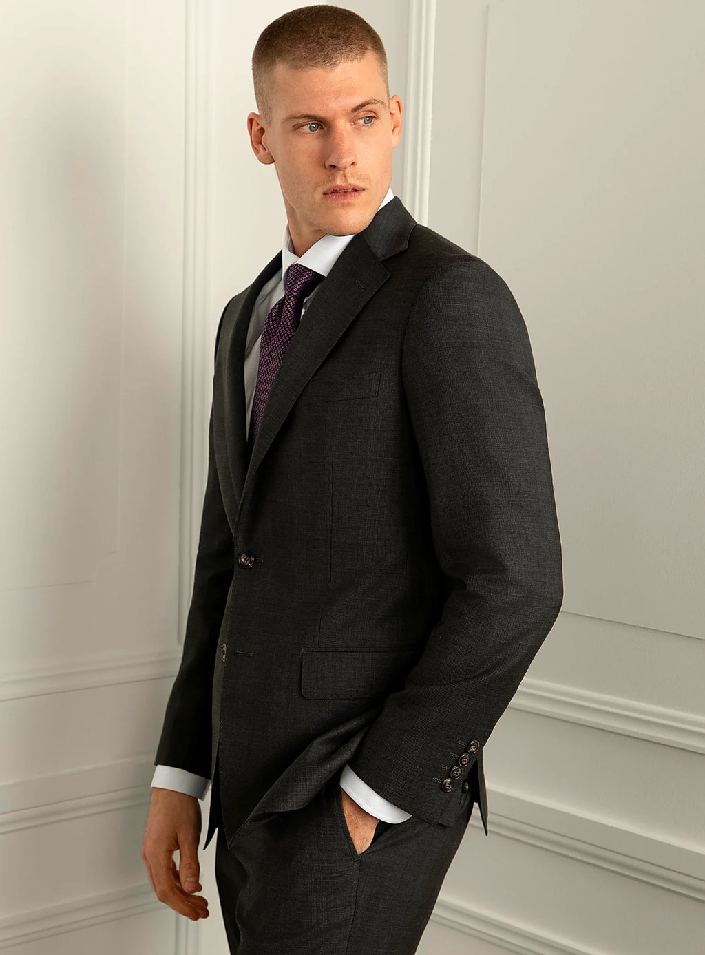 Close view of the jacket front, lapel and flap pocket