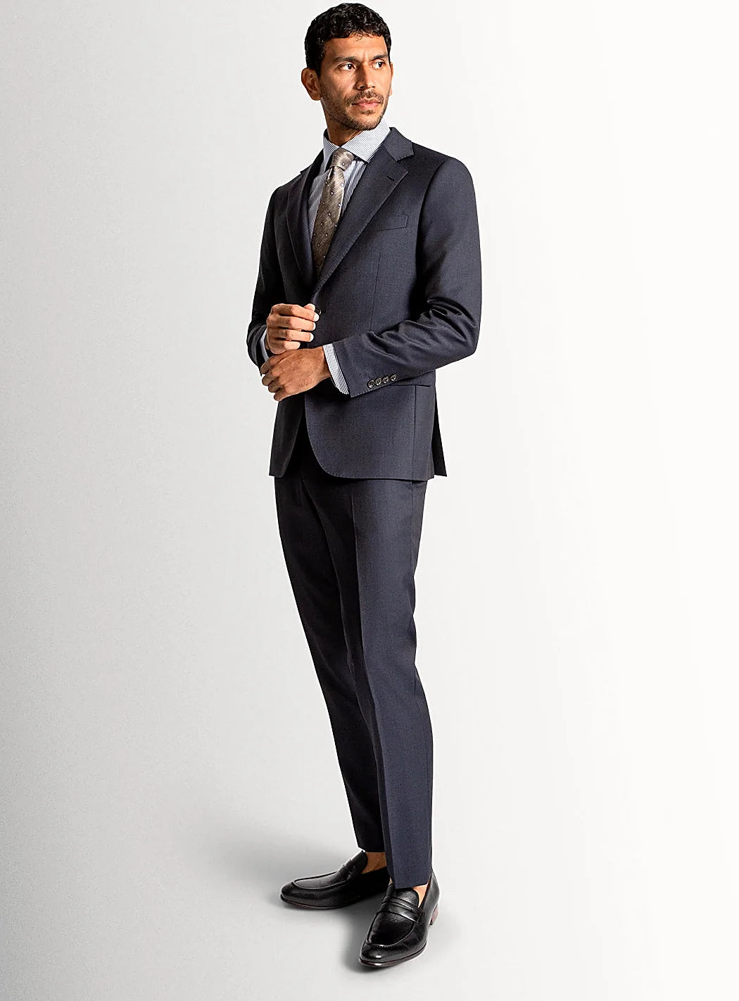 Three-quarter view of the lightweight navy jacket