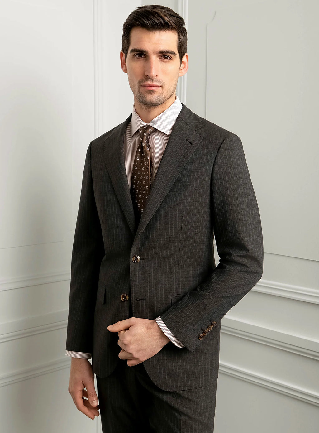 Chocolate brown fine stripe suit worn full length