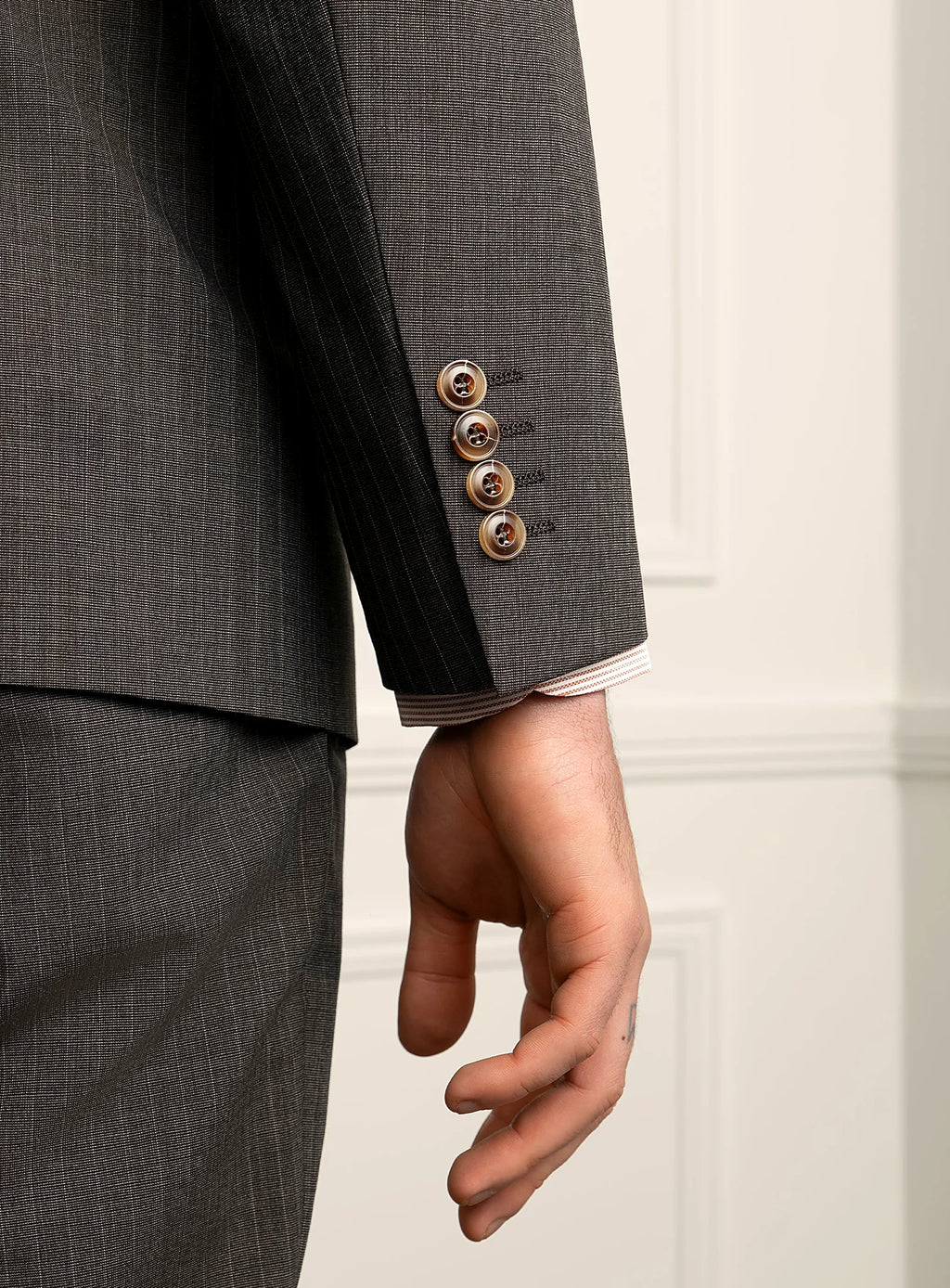 Notch lapel and two-button front detail