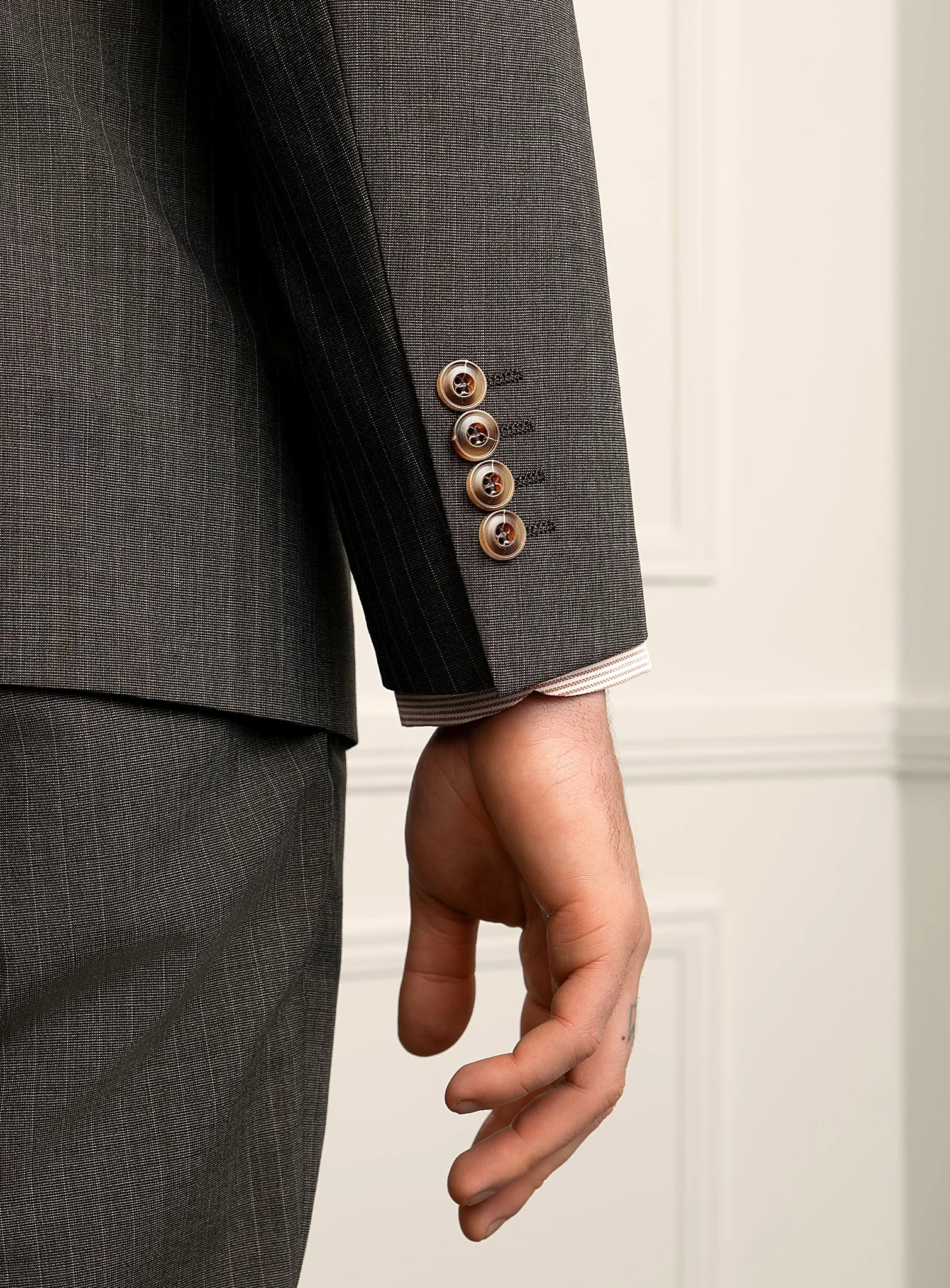 Notch lapel and two-button front detail