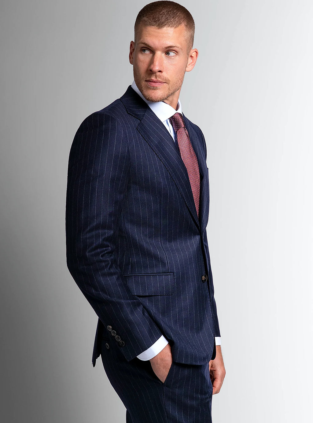 Shoulder and lapel detail of the navy jacket