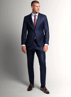 Angled view of the pinstripe jacket and trousers