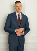 Light blue plaid suit shown full length with a white shirt