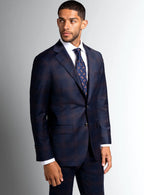 Navy bronze plaid suit worn full length on a model