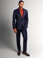 Lapel and flap pocket detail of the navy jacket