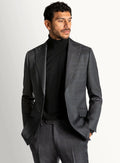 Dark grey overcheck suit worn full length on a model