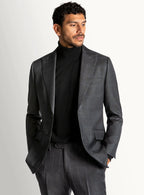 Dark grey overcheck suit worn full length on a model