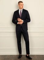 Angled view of the navy jacket and matching trousers