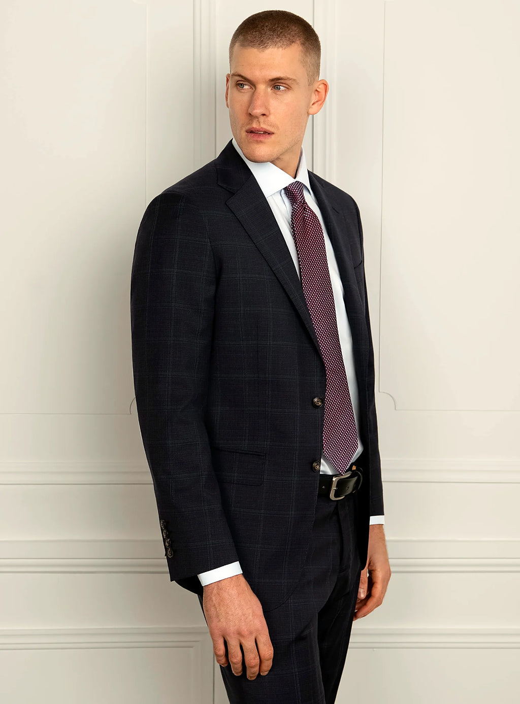 Close view of the tonal check across the navy cloth