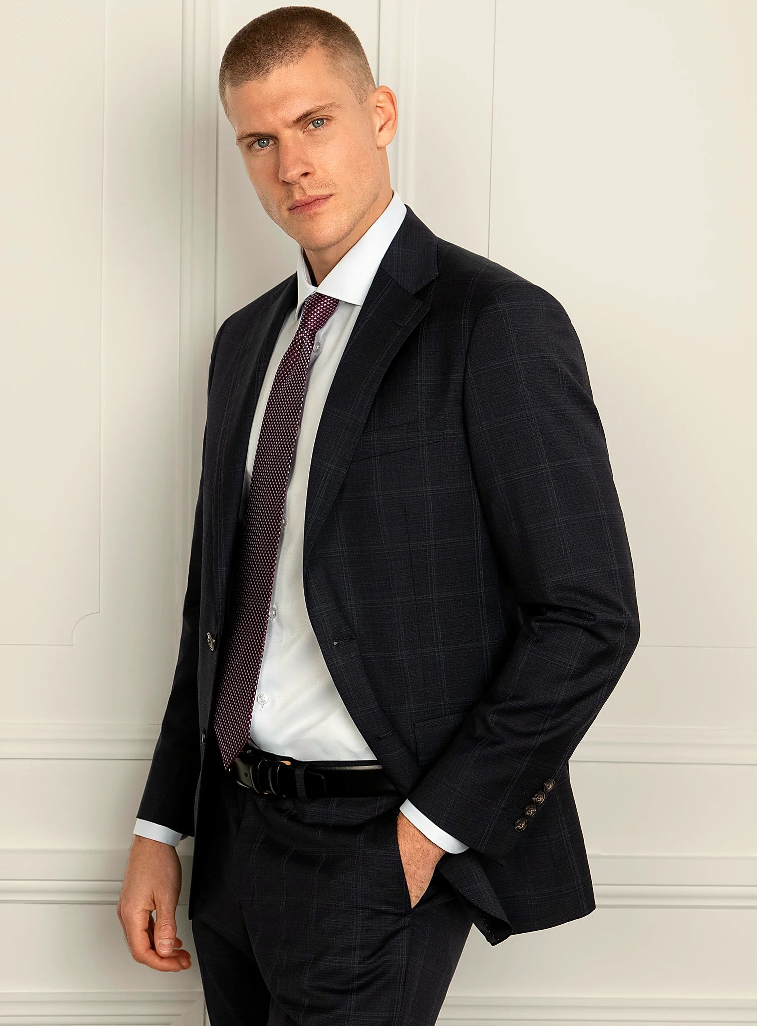 Collar and lapel detail of the navy suit jacket