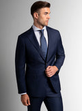 Navy plaid suit shown full length with a white shirt