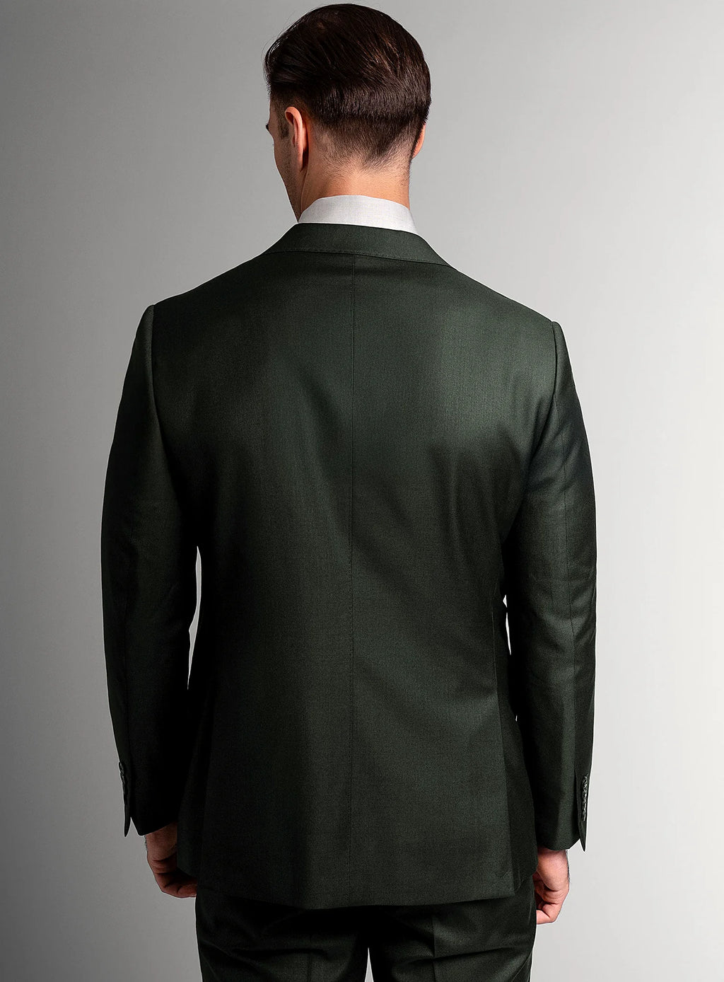 Collar and lapel detail of the green suit jacket