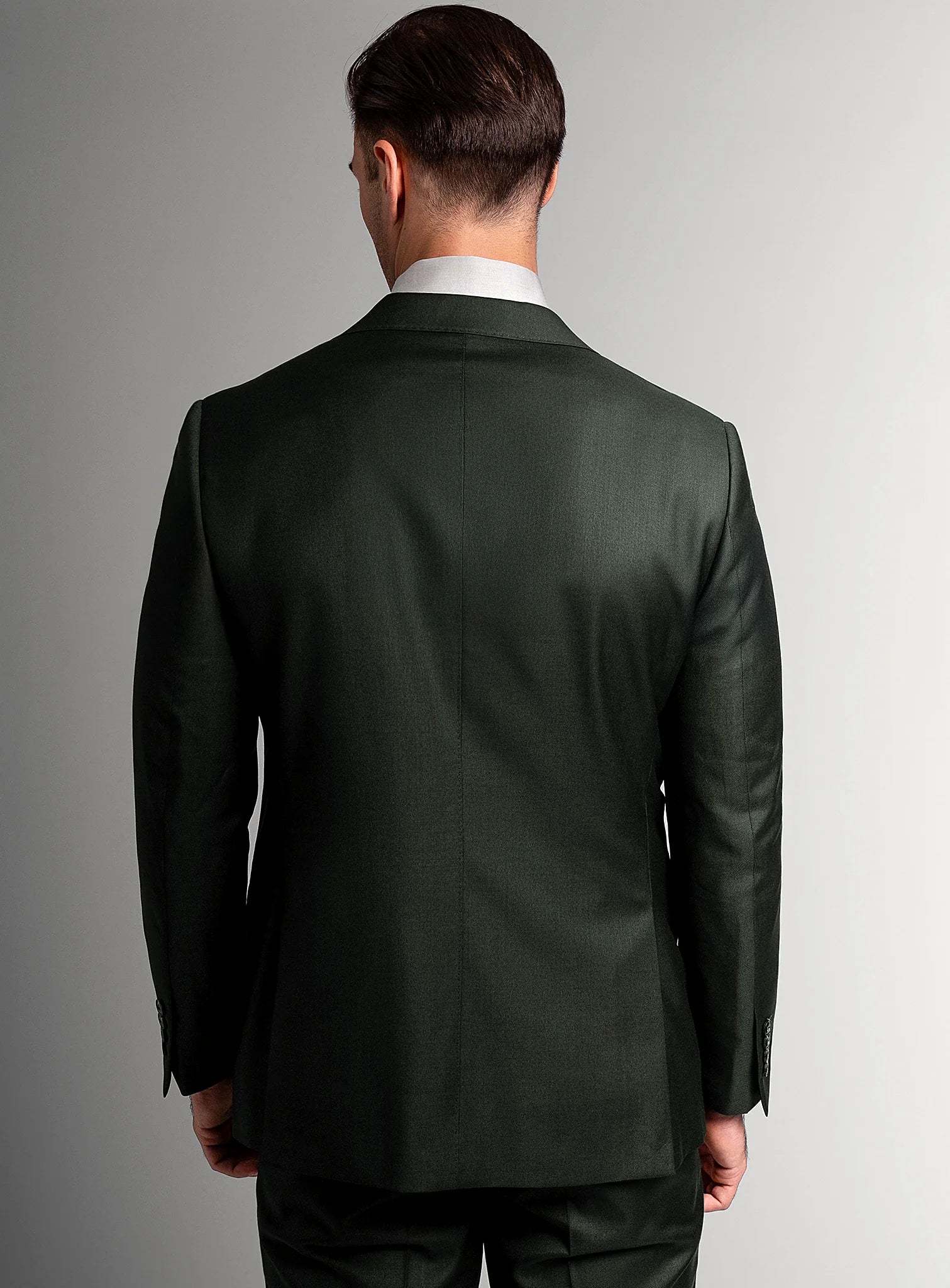 Collar and lapel detail of the green suit jacket