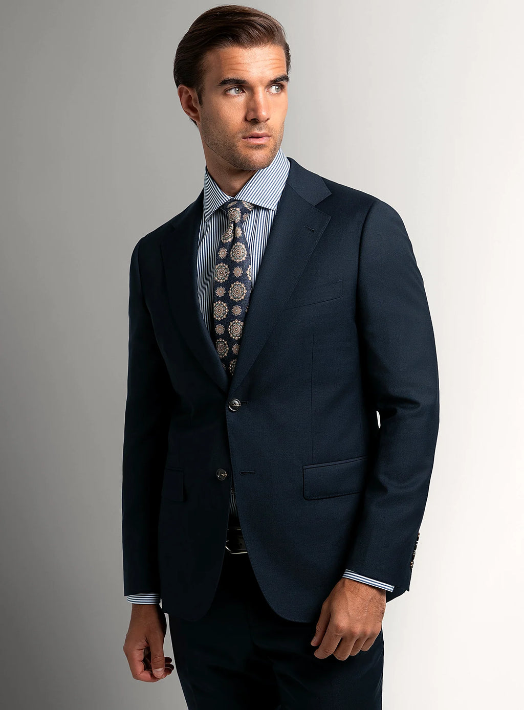 Navy basketweave suit worn full length with a white shirt