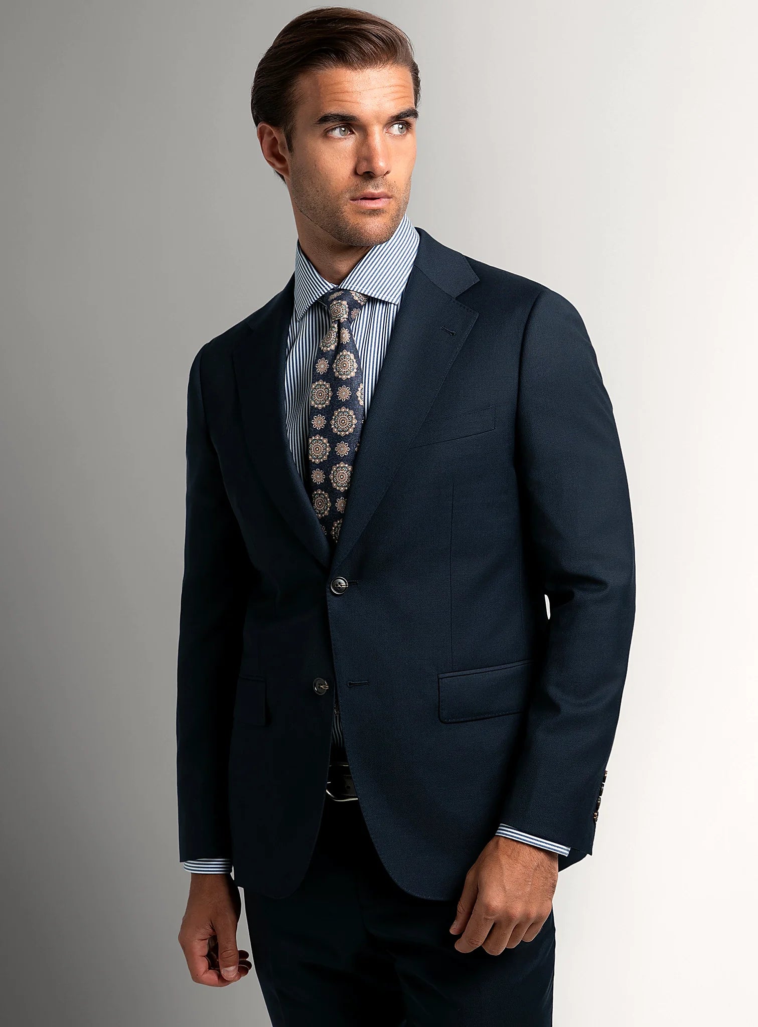 Navy basketweave suit worn full length with a white shirt