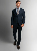 Three-quarter view of the navy jacket and trousers