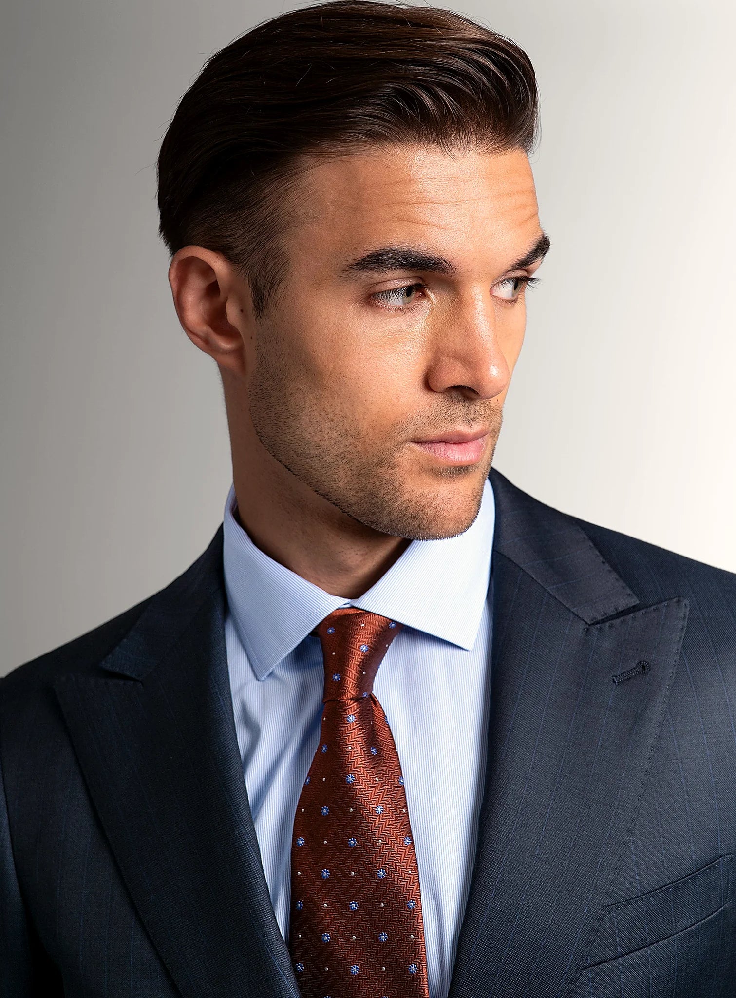 Close view of the refined pinstripe on navy