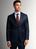 Navy peak lapel pinstripe suit shown full length