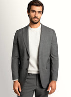 Mid grey suit shown full length with a crisp white shirt