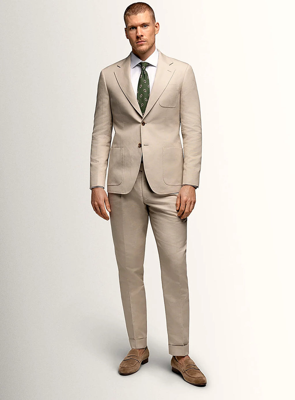 Angled view of the relaxed taupe jacket