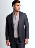 Olive green pinstripe jacket worn open over a shirt