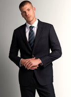 Charcoal pinstripe suit shown full length on a model