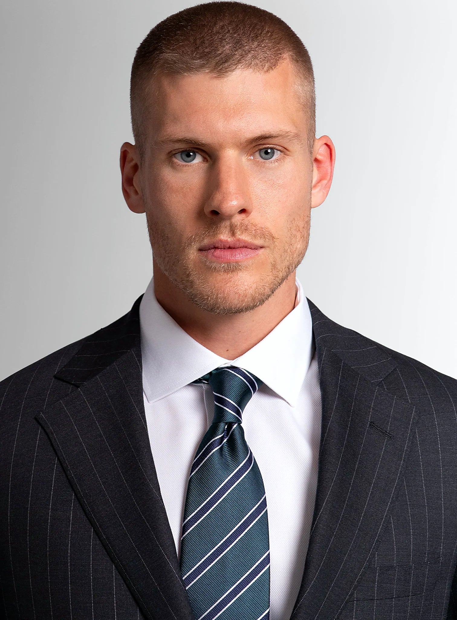 Collar and lapel detail of the charcoal jacket