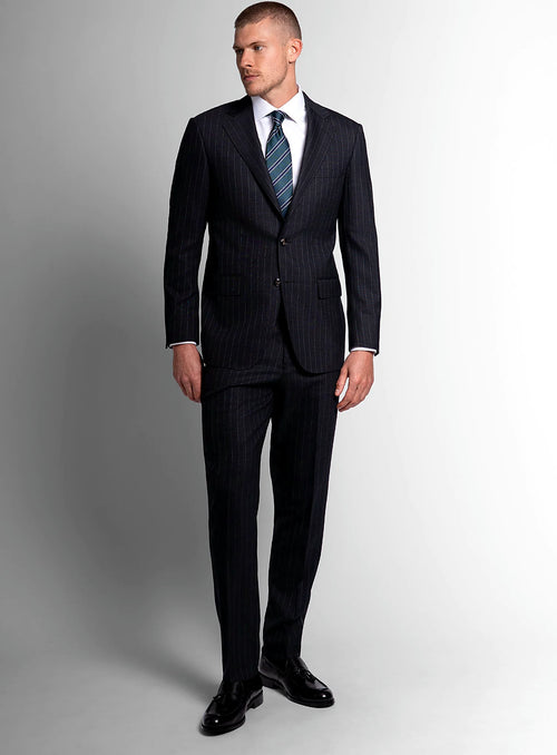 Three-quarter view of the charcoal jacket and trousers