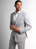 Silver grey pinstripe jacket worn open over a shirt