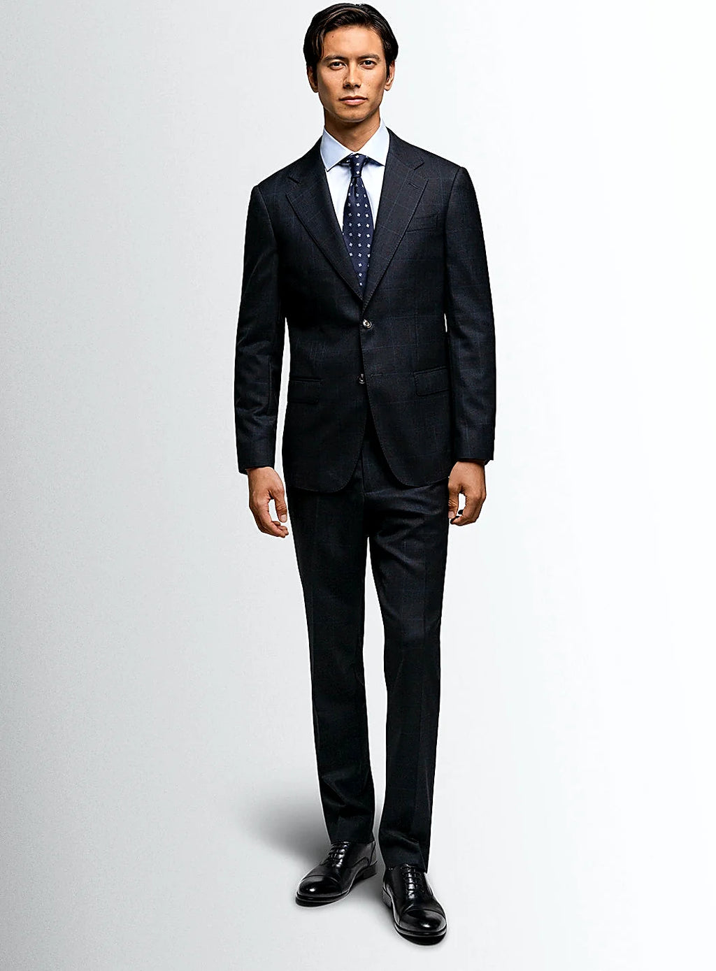 Angled view of the checked jacket and trousers