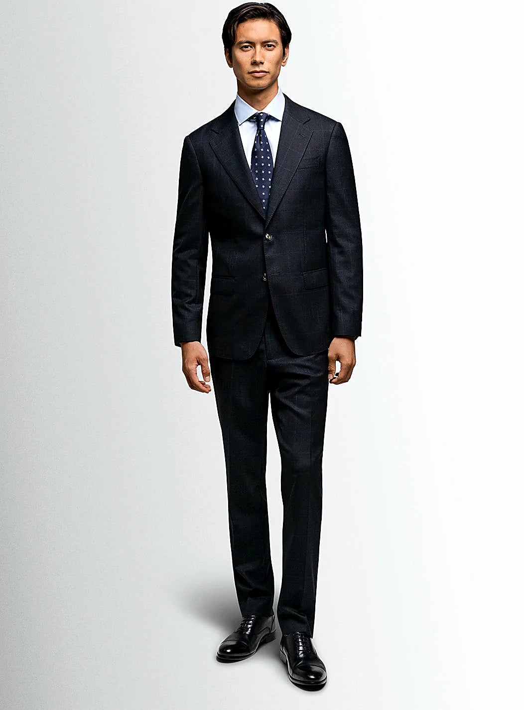 Angled view of the checked jacket and trousers