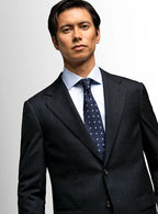 Prince of Wales check suit worn full length on a model