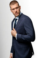 Navy microcheck suit worn full length on a model