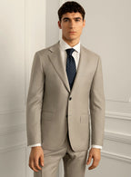 Stone beige suit shown full length with a white shirt