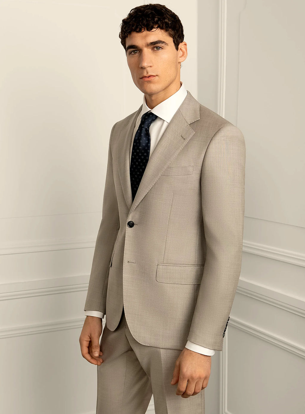 Collar and lapel detail of the stone beige jacket