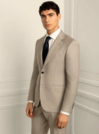 Collar and lapel detail of the stone beige jacket