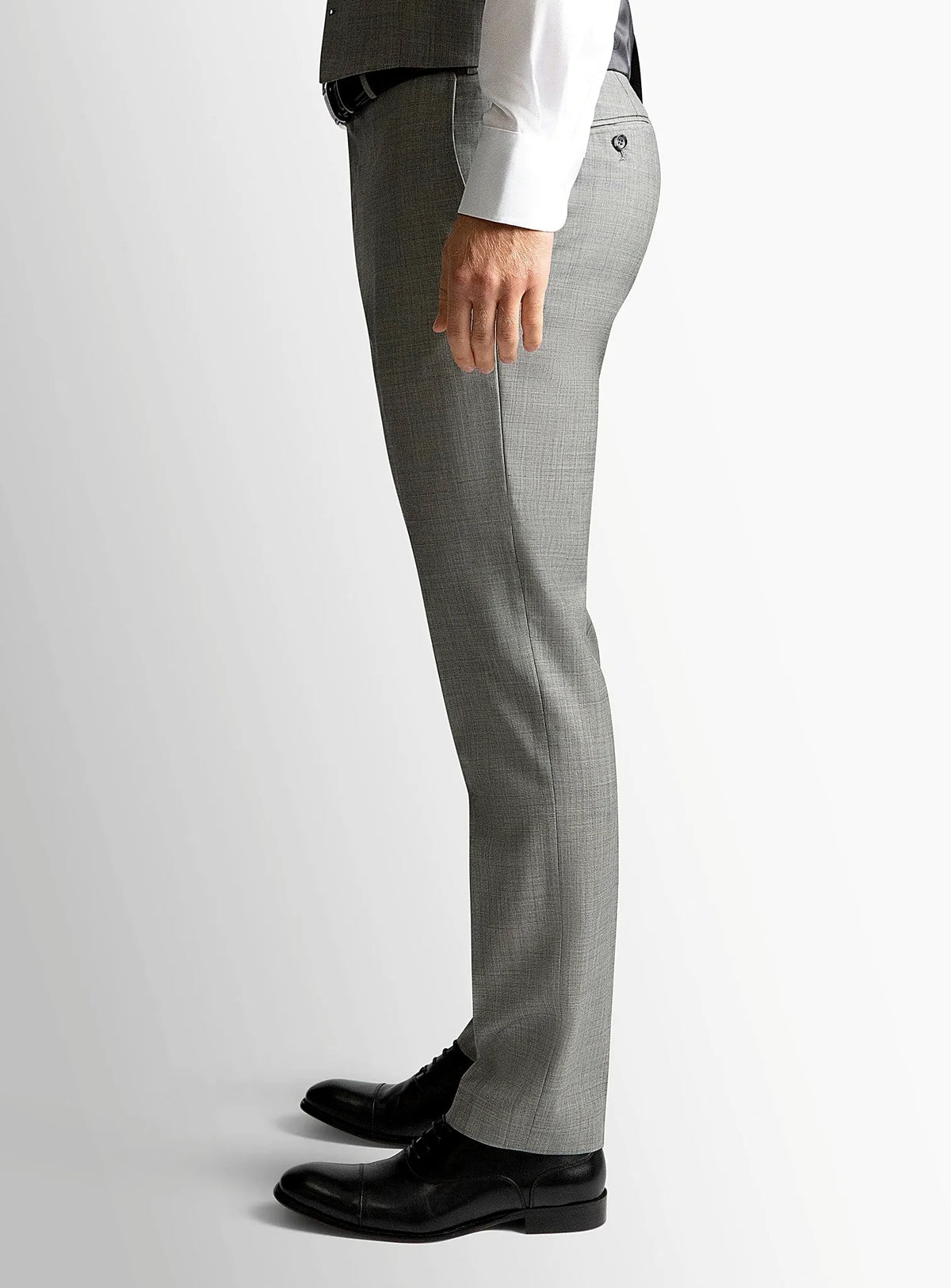 Side view of the tailored grey trouser leg