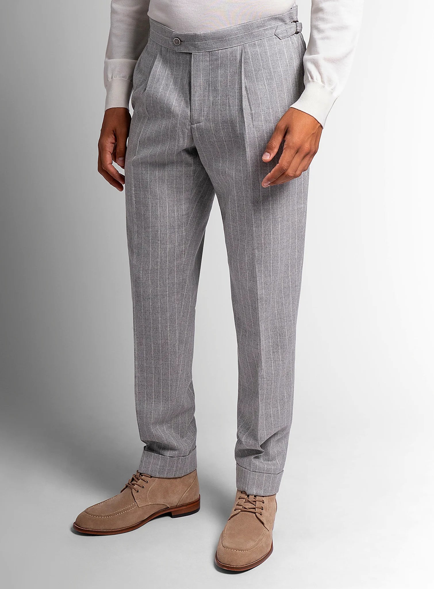 Close view of the pleated front and extended waistband