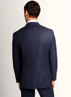 Peak lapel and chest pocket detail of the jacket